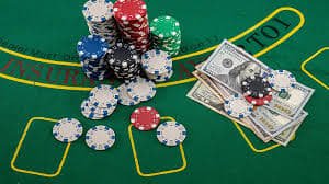 Tampilan chip dan layout meja American Roulette di idn777